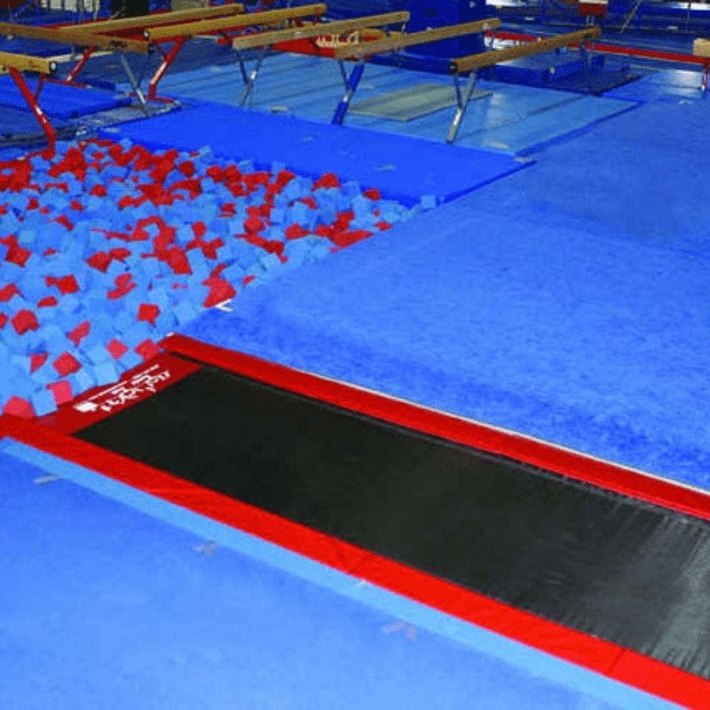 Top-down view of the Tumbl Trak Inground Tumbling Track in blue showing the full spring bed width of 78 inches flush with the gym floor surface