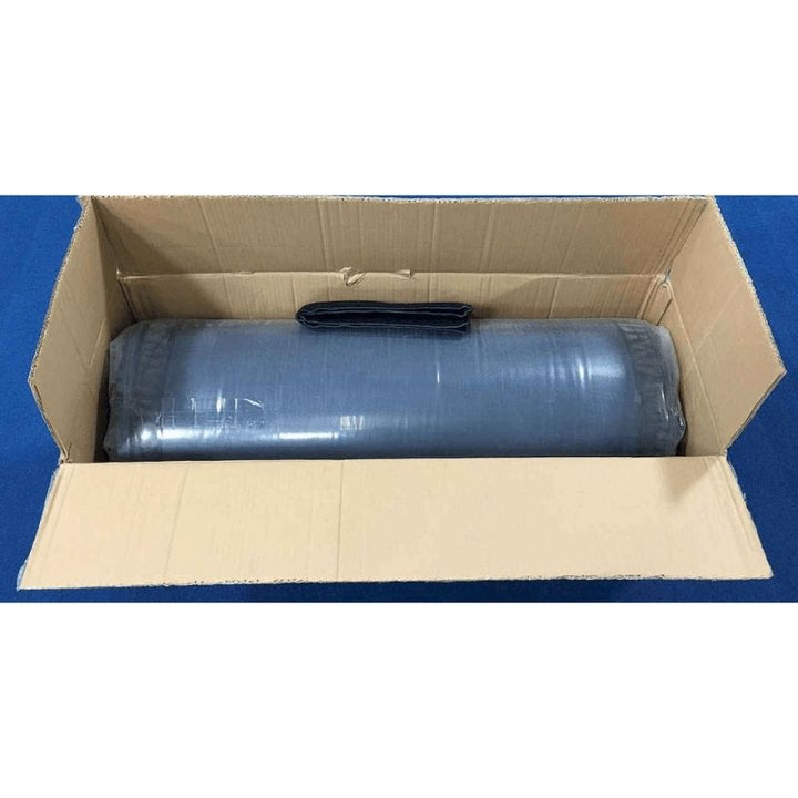 Tumbl Trak Pit Pillow shown in its vacuum-packed shipping box, demonstrating the reduced-size packaging; allow 48 hours after opening for the low-density foam gymnastics mat to fully expand before first use