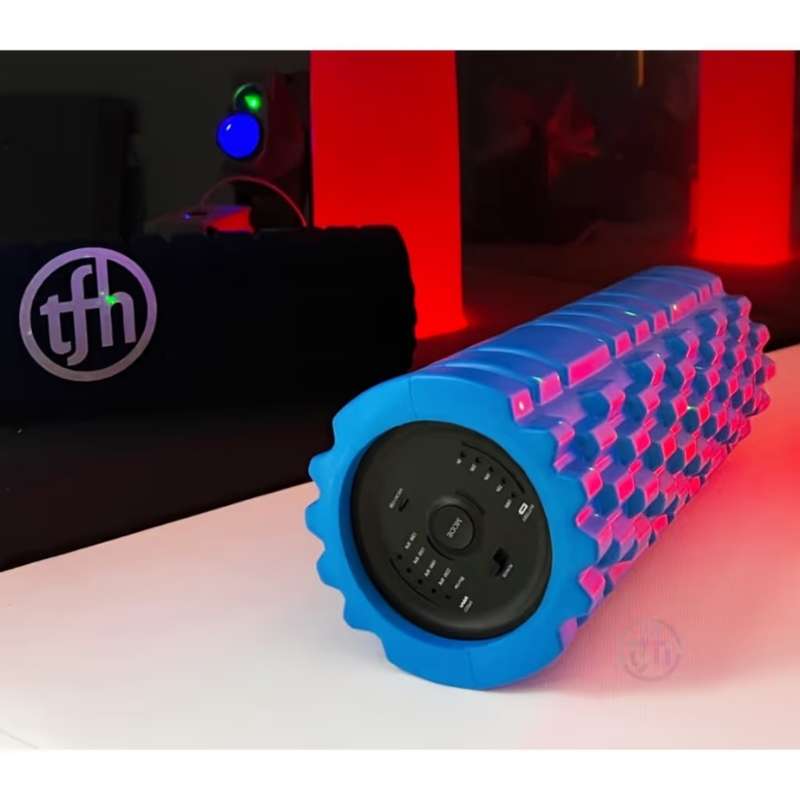 Close-up of the TFH Big Texture Vibrating Roller highlighting its textured foam ridges and control panel, a deep pressure massage roller