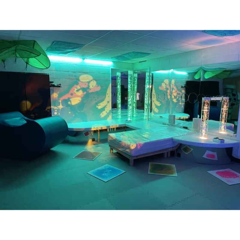TFH Vibroacoustic Waterbed built into a multi-sensory room platform alongside bubble tubes and fibre optics for immersive therapy