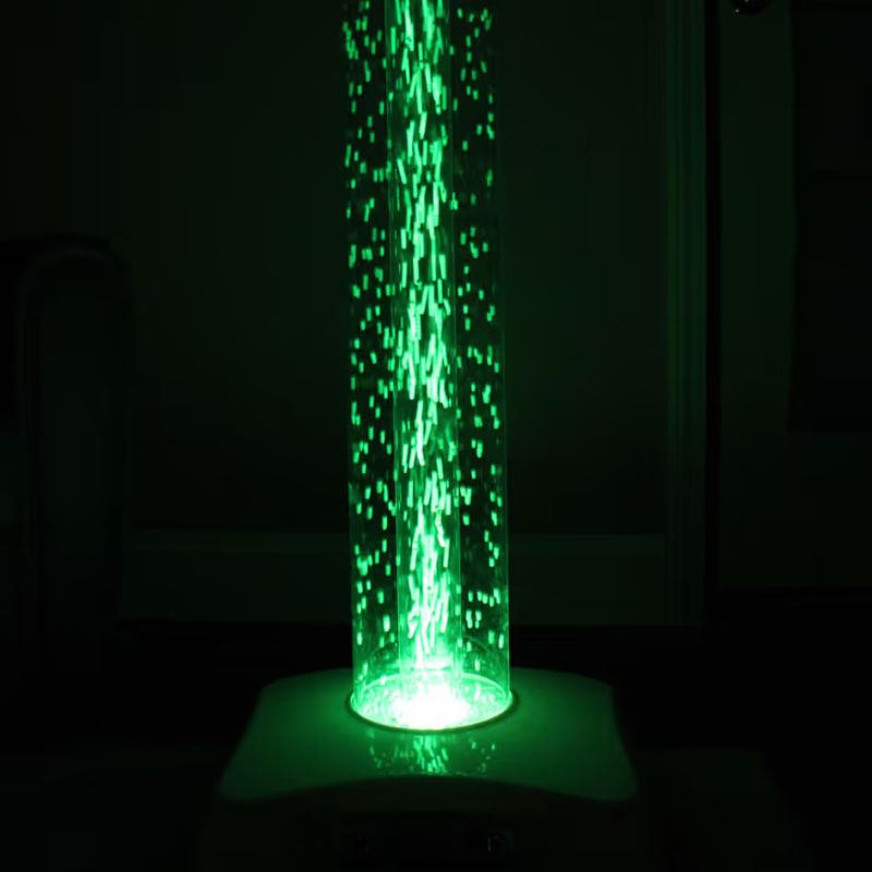 TFH Hurricane Tube waterless bubble tube glowing green with beads rising through the acrylic column