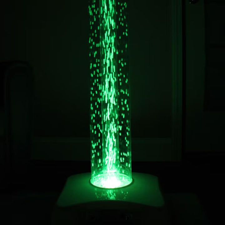 TFH Hurricane Tube waterless bubble tube glowing green with beads rising through the acrylic column