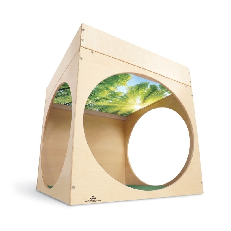 Whitney Brothers Superbright LED Creative Cube interior view showing the sunlit forest canopy image printed on the shatterproof acrylic underside of the LED light table top