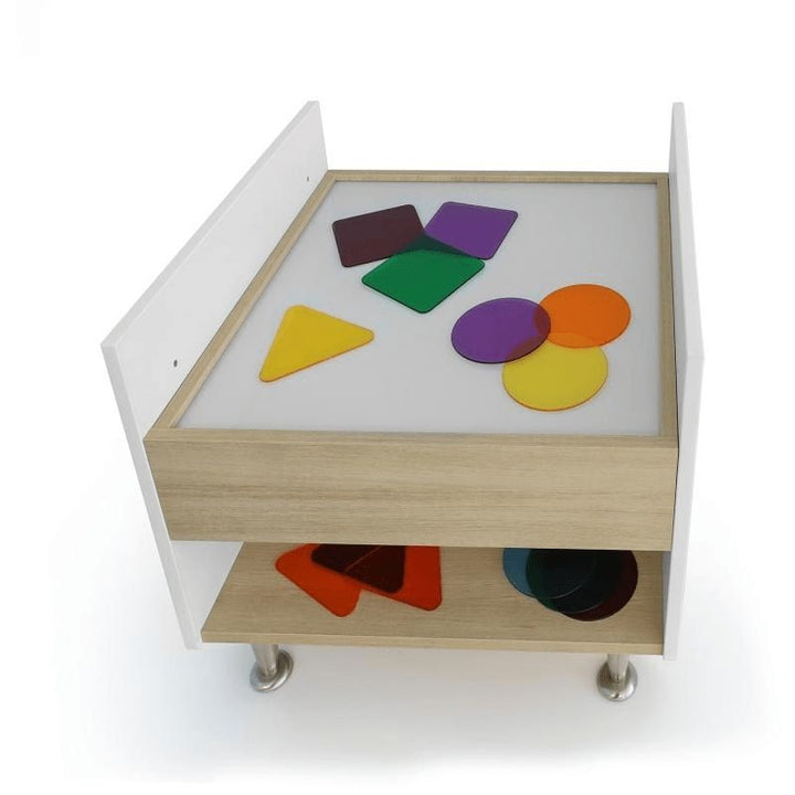 Top-down view of the Whitney Brothers elevatED Adjustable Light Table showing the full 26"x24.5" illuminated LED surface and the contemporary two-tone melamine edge detail
