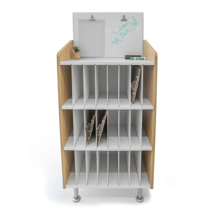 Whitney Brothers elevatED Mail and Message Center front product view showing the full 24.5"x50" two-tone cabinet with 24 vertical slots and fixed dry-erase marker board with two built-in clips