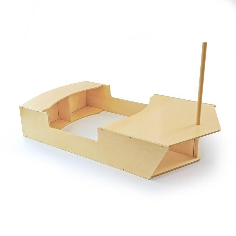 Whitney Brothers Imagination Boat clean product view showing the full 69.5" wide 15mm birch plywood play boat with open deck, crawl-through bow, and two under-seat cubby spaces