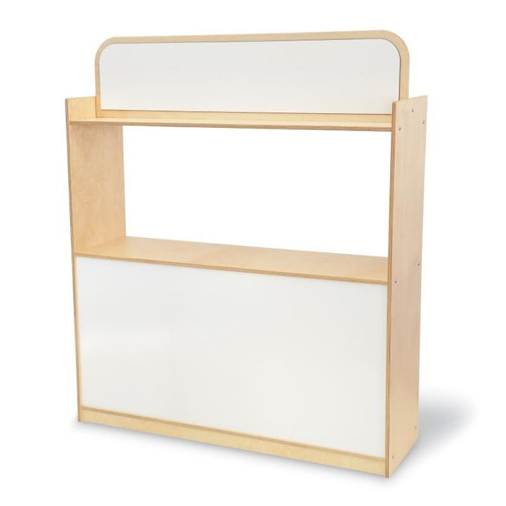 Clean product view of the Whitney Brothers Imagination Station showing the full 48.75"x57.5" birch plywood dramatic play station with dual dry erase boards and centre stage shelf