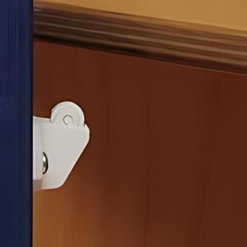 Close-up of the safety hinge on the Whitney Brothers Monaco Kitchen 3-Piece Playset, showing the continuous hinge design that prevents finger pinching during play