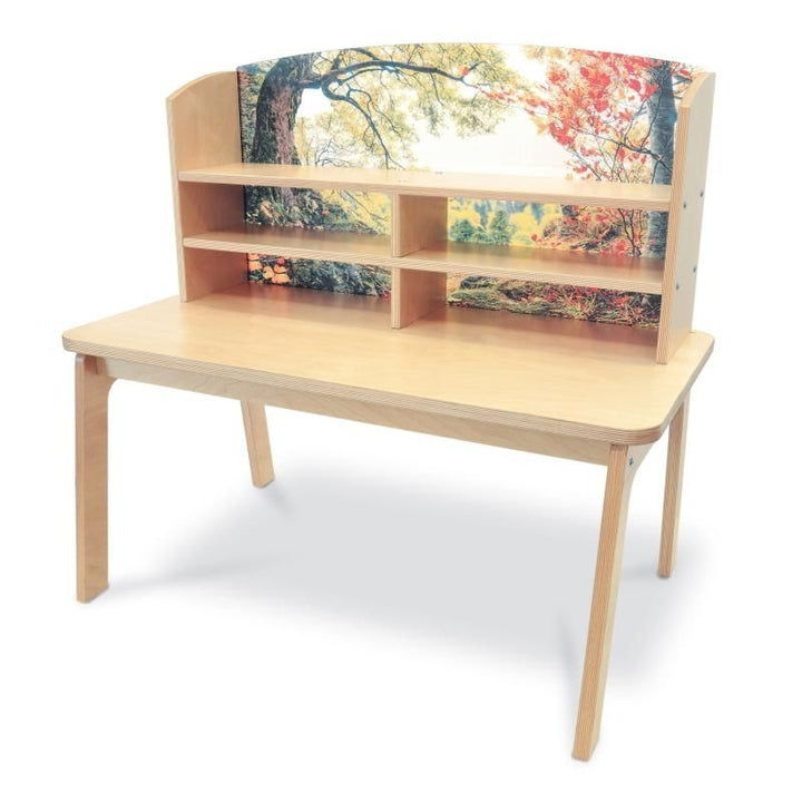 Clean product view of the Whitney Brothers Nature View Writing Center WB0856 showing the full 42.5"x26"x40" 1" birch plywood writing desk with forest scene acrylic panel and integrated shelves