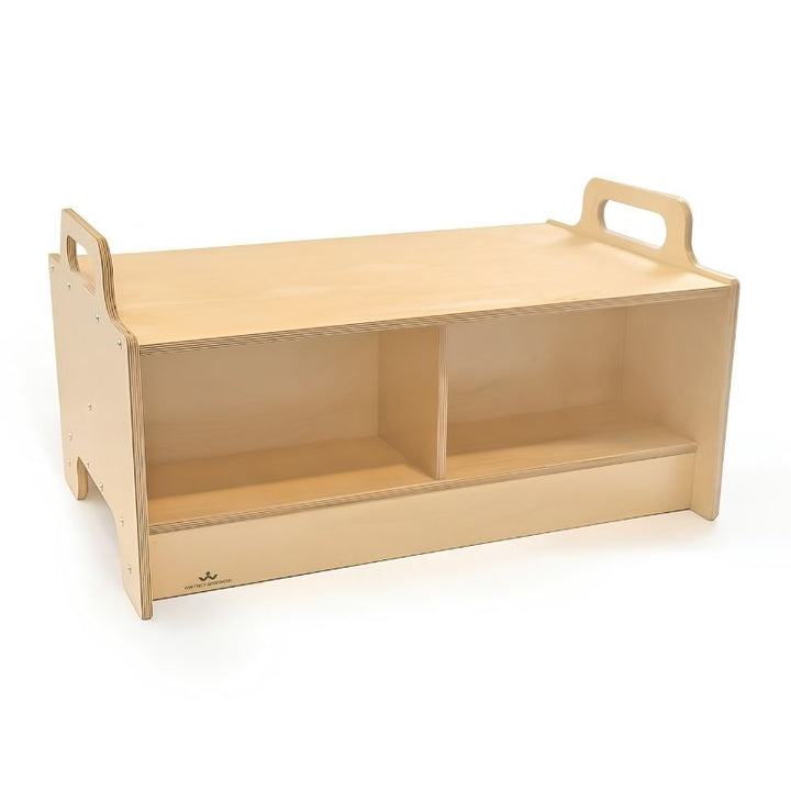 Whitney Brothers Stack-Able Bench product shot showing the two divided under-seat storage compartments, hand-hold cutouts on end panels, and natural UV-finish birch plywood construction