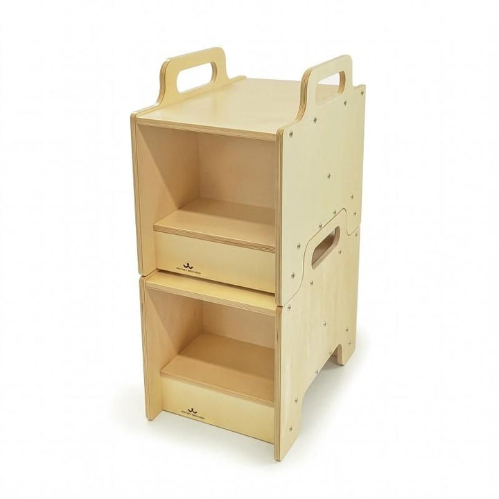Two Whitney Brothers Stack-Able Seats interlocked and stacked to create a two-tier open storage cabinet, demonstrating the flexible classroom furniture design that converts seating into storage