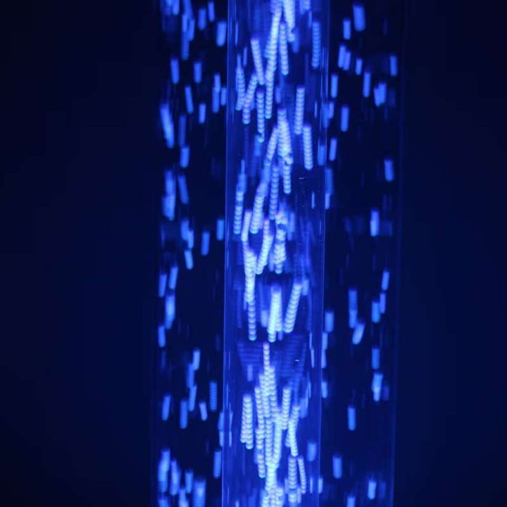 Close up of light beads swirling inside the TFH Wireless Hurricane Tube, a waterless sensory light shown in calming blue