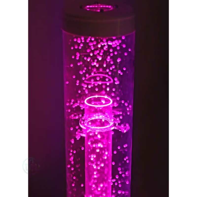 Close up of the TFH Wireless Hurricane Tube's internal mechanism glowing pink, a waterless sensory light for calm corners