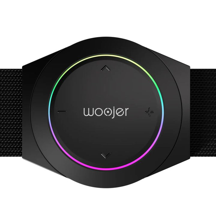 Front close-up of the Woojer Strap 4 haptic audio device showing its volume and intensity controls inside a multicolor light ring