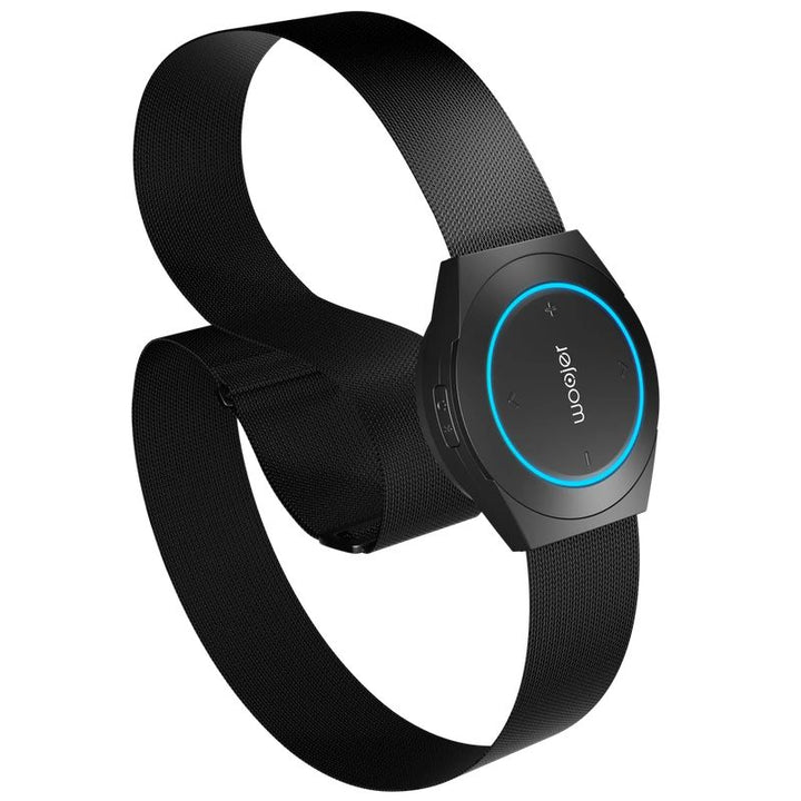 Woojer Strap 4 wearable haptic device with its adjustable woven strap and glowing blue light ring, a portable vibroacoustic wearable for music and gaming